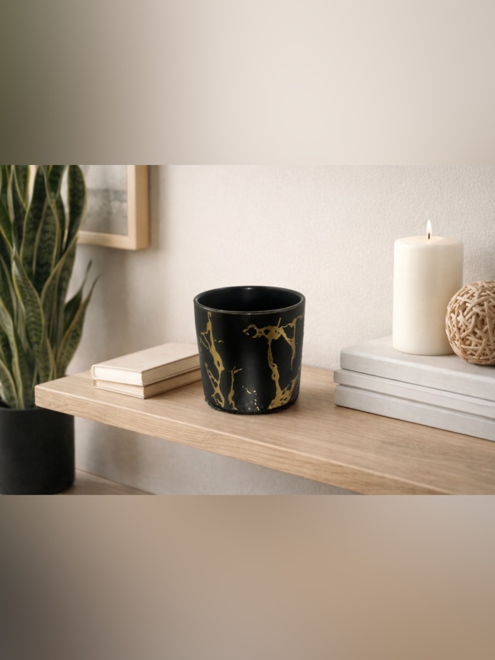 black and gold decorative cup